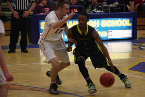 Carvon Robinson (11) drives the lane in the Tigers game against Jackson. 