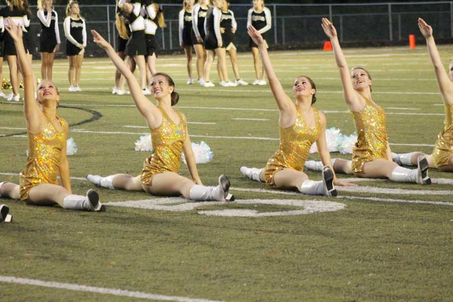 The Golden Girls perform before the Homecoming game against Seckman on Oct. 3.