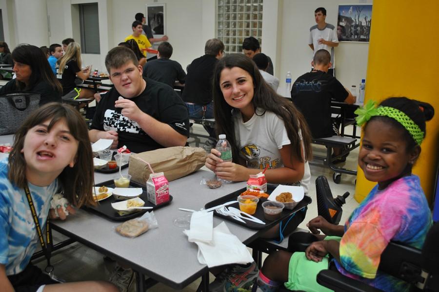 Friendships form as Leadership and SSD students eat lunch together.
