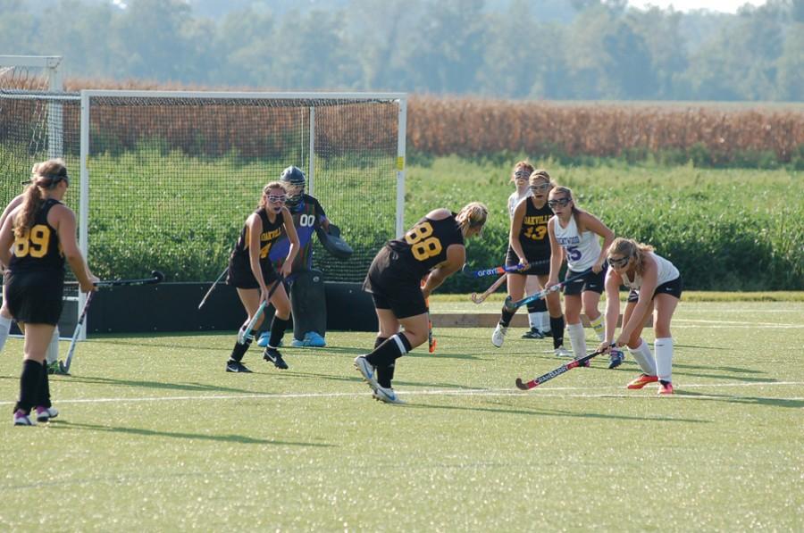Lydia Flieg (11) takes a shot during a game against Brentwood. The tigers won the game 5-0.