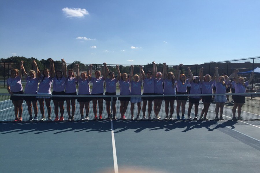 The 2015 girls tennis team poses just before their match. Photo courtesy of Rachel Kendrick.