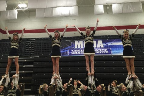 OHS cheerleaders wave to the crowd at MCDA.