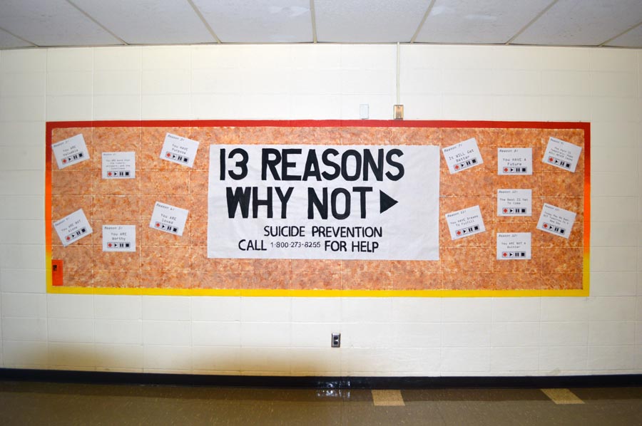 13 Reasons Why Not poster hangs in second floor hallway.