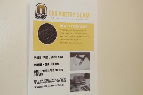 Poetry slam poster hangs on the wall on Jan. 26.