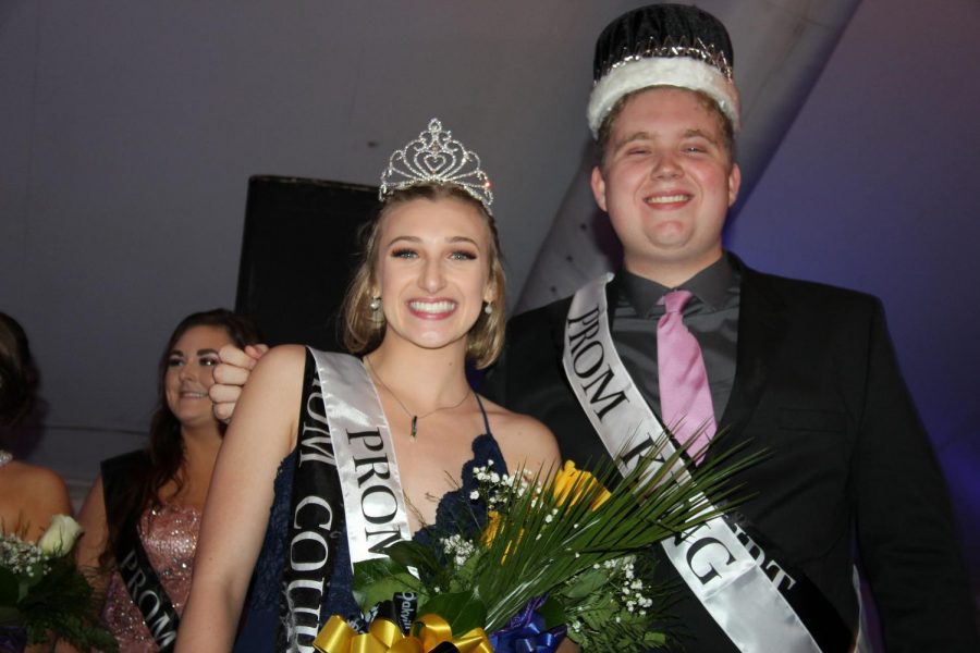 Prom Queen Hannah Baker (12) and King Corey Chase (12) smile for a picture after being crowned.