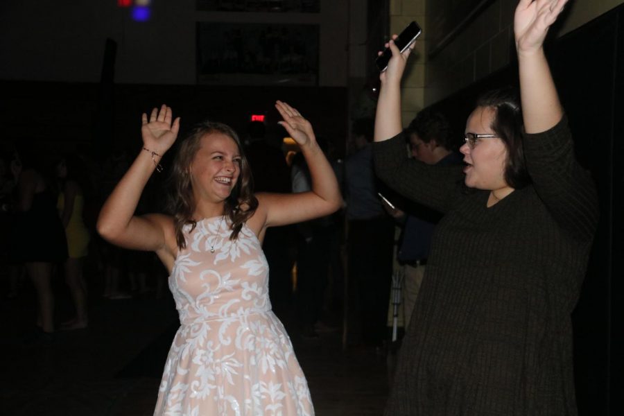 Norah Kovac (11) laughs while dancing with her friends.