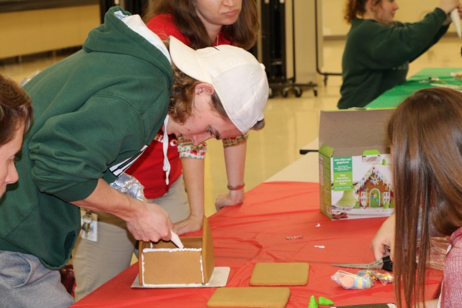 Winner Nathan Long (12), focusing on building his gingerbread house.