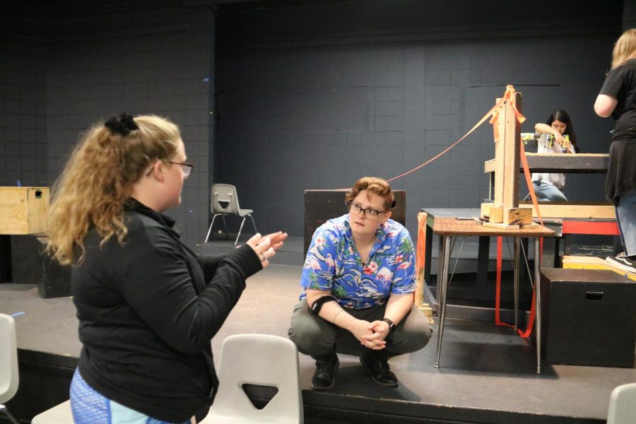 Isabella Wirthlin (11) talks to Ms. Melissa Harper about the design of the show. 