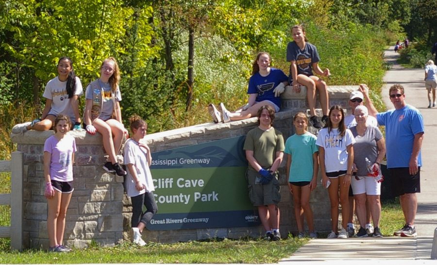 Eco-Art club poses for a picture the day of the Cliff Cave clean up. 