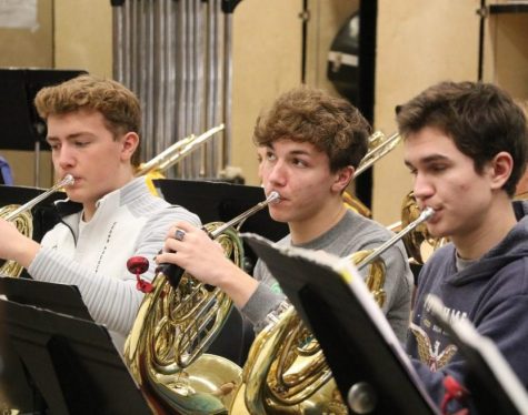 Scott Bellovich (10,) Ben Lanier (11) and Colin Akers (12) prepare for their band trip to Truman. The band will be going Feb. 27-28 for a workshop.