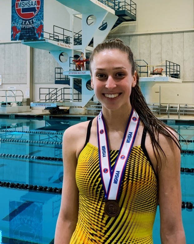 Mason Meinershagen (9) smiling after her fifth place at the state dive competition. 