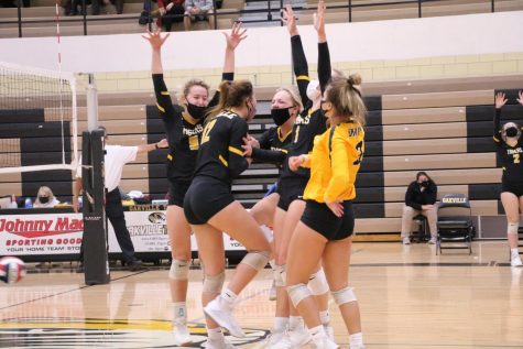 OHS volleyball celebrates winning a point against Mehlville on Oct. 29.