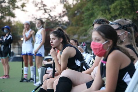 Even from the sidelines, Natalie Gang (12) and teammates anxiously watch OHS play Westminster on Oct. 22. Prior to this game, OHS let in no goals. 