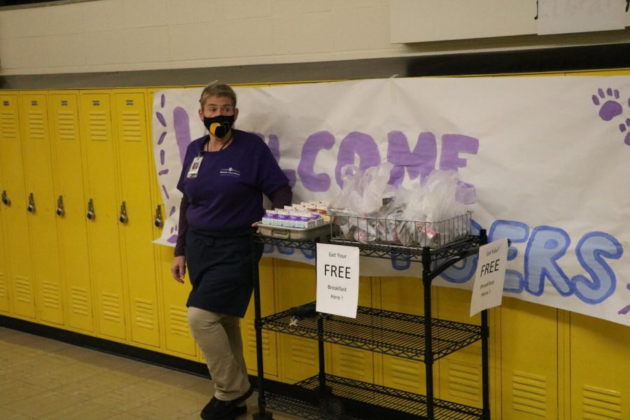Mrs. Dianna Bowcock gets ready to hand out breakfast snacks to students. Students get free breakfast and lunch everyday this school year.