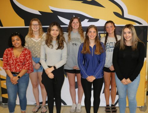 Seven journalism students earn national recognition from the JEA competition. Front row: Avery Neal (12), Layla Halilbasic (10), Eva Bidle (11), and Lejla Pozegic (10). Back row: Cassandra Ludwig (12), Meg Heveroh (12), and Jojo LaBrier (12)