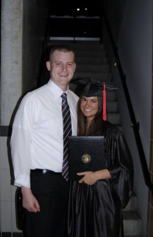 Journalism teacher Christina Manolis and her husband pose for a photo at her college graduation in 2011. They met in 2007 and  got engaged on April Fools Day 2011. 
