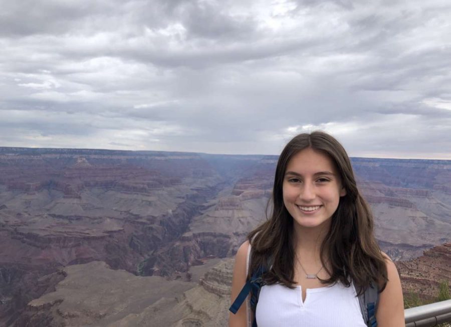 Junior Brooke Weiss poses in front of the Grand Canyon last summer. “We went down to one of the points, and we saw a really beautiful sunset and got some pretty pictures,” Weiss said. Weiss said she enjoyed walking the canyons and seeing all the beautiful  views. 