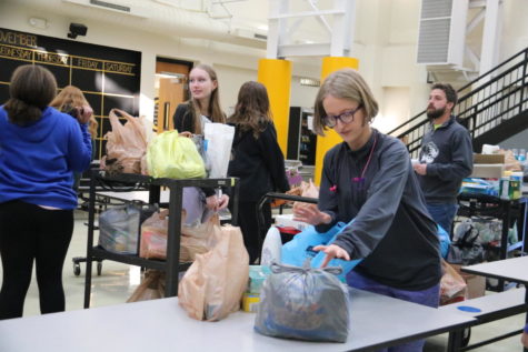 On Nov. 21, 2022, Isaac Freitag helps direct StuCo members at the Food Drive. “... [I like] where there are a lot of students leading it and facilitating it, as opposed to structure and lecture,” Freitag said. Freitag wants to continue being the co-sponsor with Laura Bishop in Leadership. 