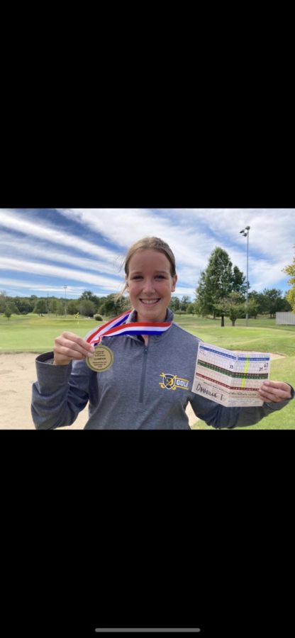 Ava+Ross+%289%29+poses+with+her+medal+and+scorecard+after+winning+the+Lindbergh+Golf+Tournament.+Ive+been+playing+since+I+was+five%2C+and+my+love+for+the+sport+has+grown+more+and+more%2C+Ross+said.+Ross+won+the+tournament+with+a+score+of+67.