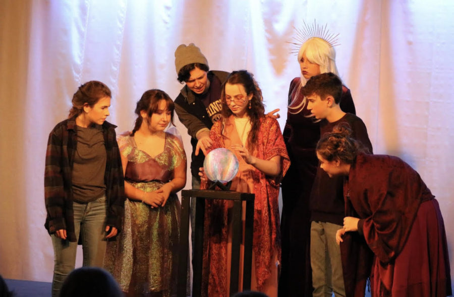 The cast of A Wrinkle In Time performs the scene Happy mediums cave on Nov. 17, 2022. “ …It does get stressful at times. But overall, I think its really fun and rewarding,” Macy Judd (11) said. Director Isabelle Zurcher made this large, challenging show happen in her first year of teaching.

