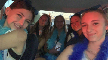 Taylor Beranek (12), Katie Townsend (10), Camryn Doerr (9), Austyn Schnur (11) and Emily Pizzella (12) take a selfie after a successful “kidnapping.” “Its a great memory to have,” Beranek said, “and it helps with team bonding.” After the selfie was taken, the girls met with the team and had Panera and Starbucks for breakfast. 