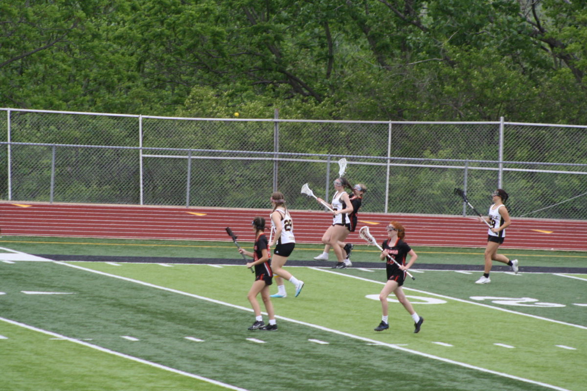 Last seasons lacrosse teams runs down the field, reaching for the ball. It was a really intense game and I was so worn out after, Olivia Kiethline (10) said. Kiethline had been playing since her freshman year and plans on continuing in future years.
Courtesy of Amra Talic