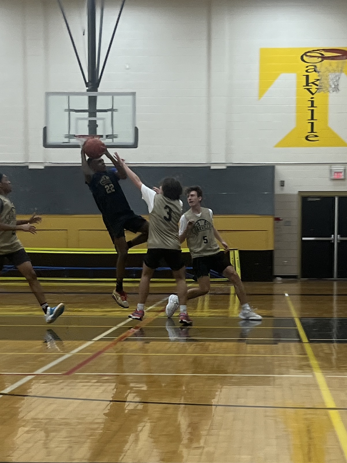 Darnel McDonald (11) goes up to make a shot during a scrimmage in practice. “I am pretty excited about the season,” McDonald said. “I am ready to win some games.” McDonald has had varsity basketball experience since his freshman year.