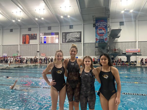 Maria Parisi (12), Riley Parisi (10), Isabella Poertner (9) and Kaylee Nguyen (12) pose at St. Peters Rec-Plex after competing at state. “We basically talk about how our plan is either to go faster or just do better overall,” said Poertner. “Then we cheer each other on while we’re swimming and we just basically collaborate on how to do better.” She added that she was excited to qualify for state, following in the steps of her siblings.