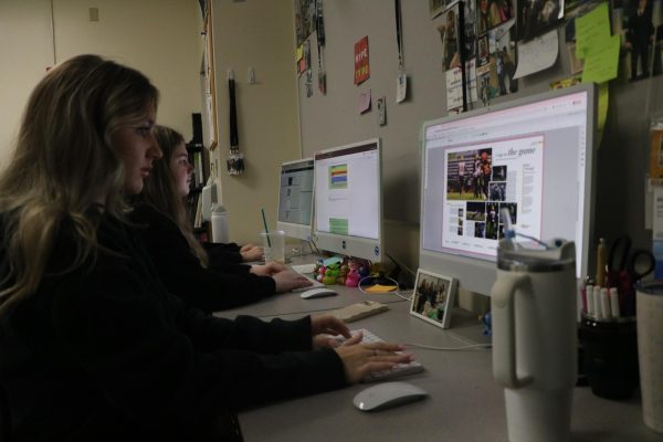 Johnston and Goodman work on completing their spreads for yearbook before the deadline. “I think yearbook is the hardest only because there’s very strict deadlines. We have to submit pages to get it printed,” Johnston said. “It's not like you can make up late work because pages have to be submitted and there's a lot that goes into each page.” Although yearbook may be the hardest, Johnston and Goodman both agree that it was their favorite class of the three journalism courses.