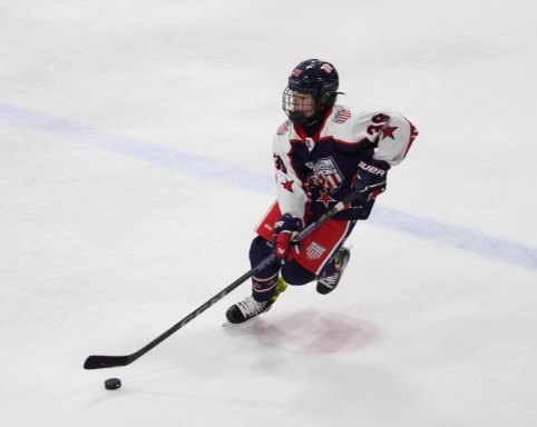 Colin Fregin (9) skates up the ice on a fast break at Affton Ice Rink on Nov. 19. 2024. "There hasn't ever been a moment when I haven't loved playing hockey and the rush it gives me," Fregin said. Fregin has been playing hockey since he was three years old.