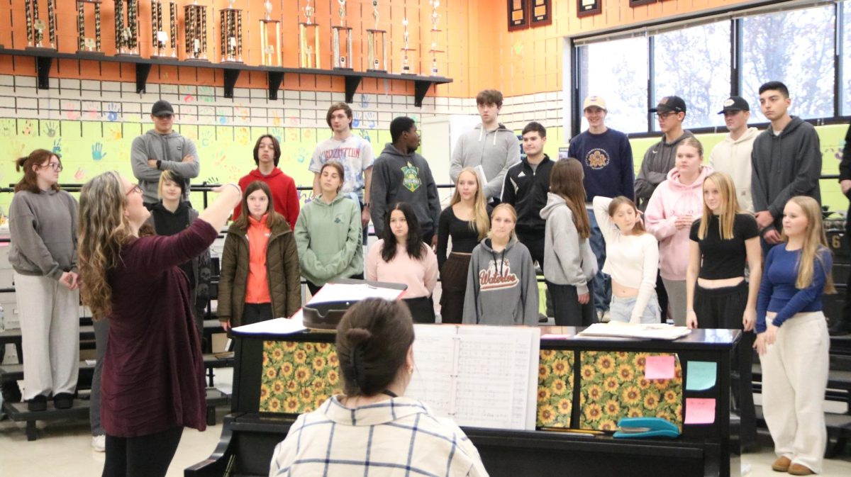 Choir teacher Chelsea Ayres directs the mixed concert choir while accompanist Emily Smith plays the piano. "What we do at OHS is we get music for the students and make tracks for them so they have access to practice and learn on their own," Smith said. Four students from the choir were chosen to perform at Missouri All-State Choir. 