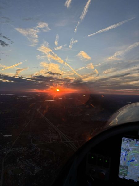 Zoe Simeral (12) captures the view from the air during one of her training flights for her pilot's license. She loves the feeling of confidence she gets when she flies. "I love going to different airports, like arriving, leaving..." Simeral said. "I love doing that." 