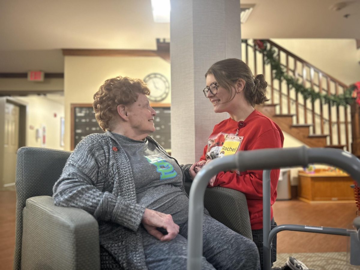 Friendship Village employee Rachel Sievers and resident Sandra Koenig chat in the lobby of the Assisted Living building. “I love to talk to the employees,” Koenig said. “They make me feel better and feel happier and I love them so much.” 