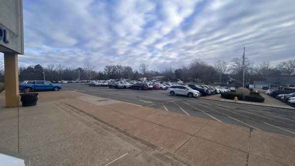 Cracks and dips are shown in the OHS parking lot. 