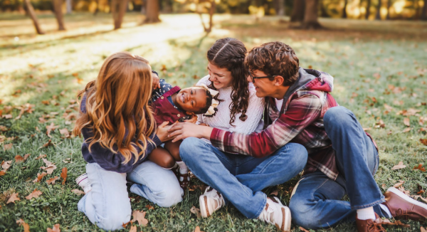 Norah Brandt (11), Annabelle Brandt (10) and Judah Brandt (9) pose for a family picture with their foster sister Lovely. “She is the cutest thing. She is very sassy, she has a lot of attitude, she's very funny, keeps us all on our toes, and she never sits down…” Annabelle said. “She's just the best.” The Brandts will be adopting Lovely on Jan. 13, 2025. 