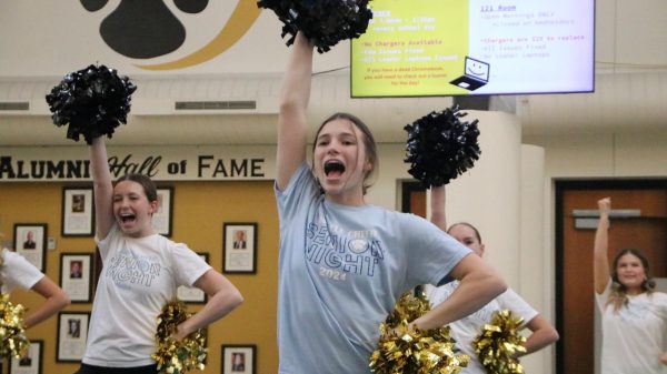 Olivia Hennessy (12) practices with her team after school. “We keep each other up and give each other critiques when need be," Hennessy said. She said that the team needs a lot of energy for their upcoming competition.