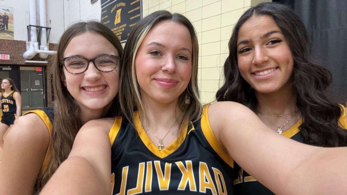 LIzzie Westcoat (12), Olivia Johnson (12) and Alanya Dickerson (12) pose for a picture together. "So if I hadn’t join that team, I wouldn’t have met the people I surround myself around all the time," Dickerson said. She also added that she planned on continuing her basketball career in college.