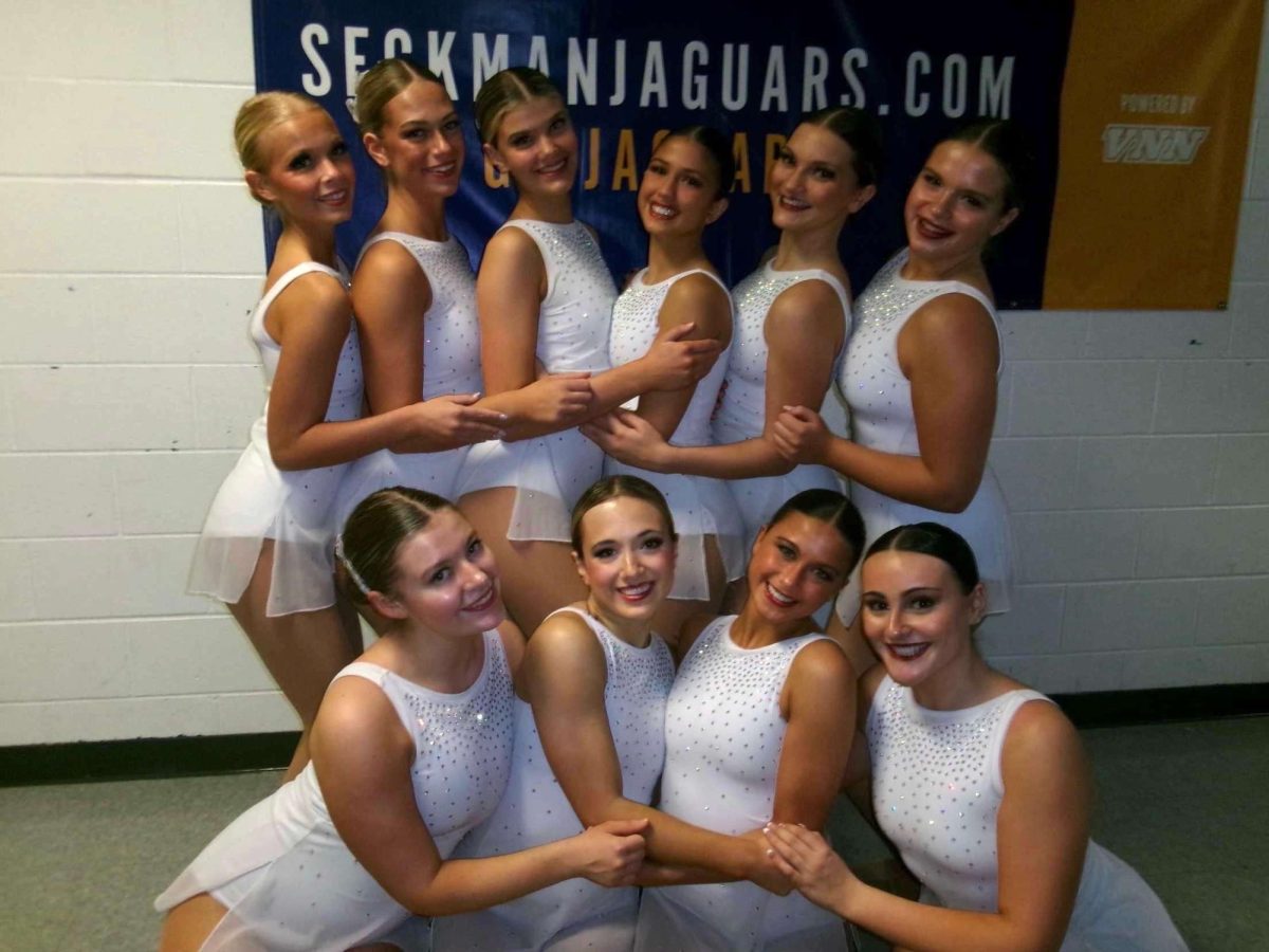 The Oakville Golden Girls pose for a group photo at one of their competitions. “I've made a lot of new friends and it's made it more exciting," Ella Rick (9) said. She added that the competition team wa a close group that was fun to be with.