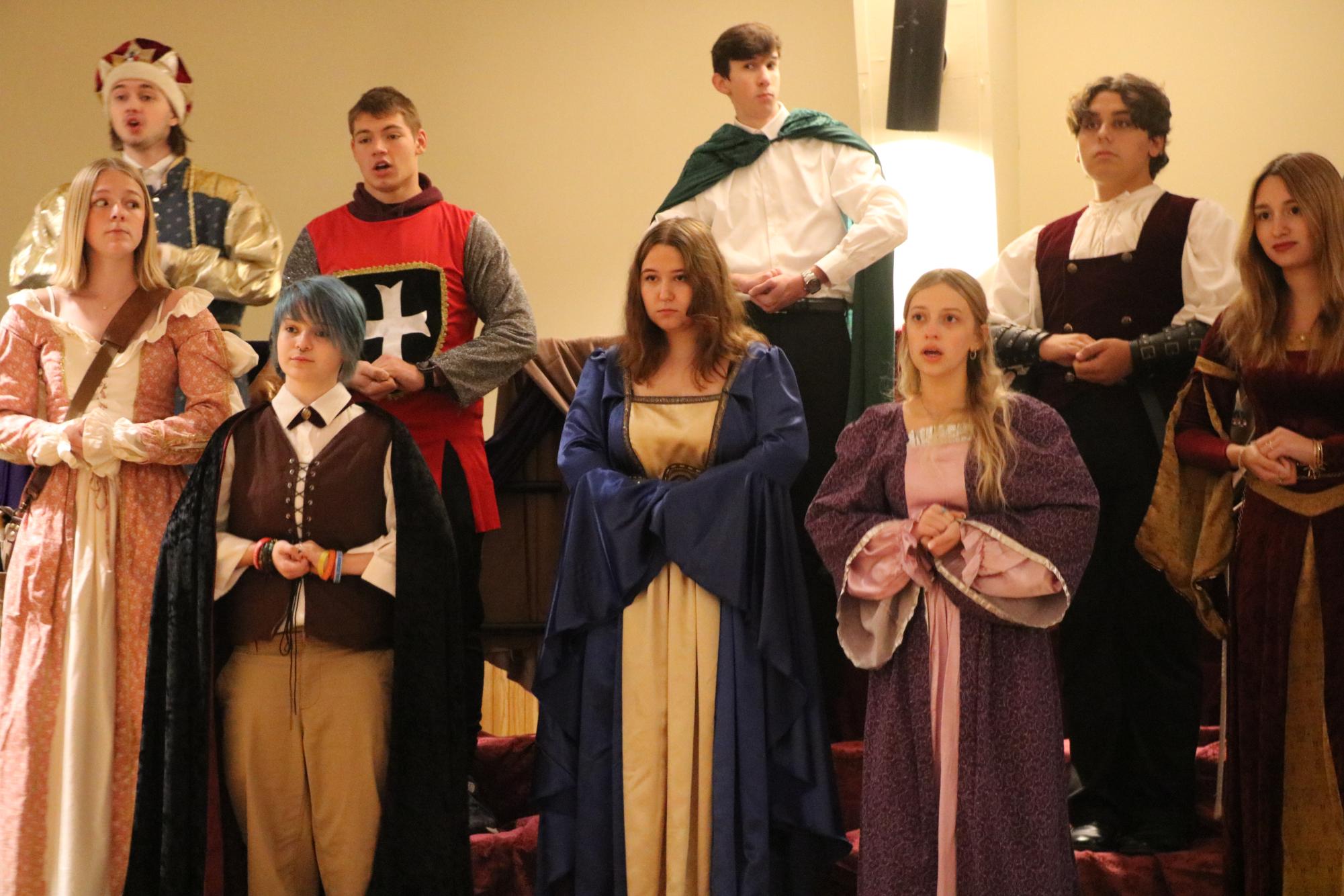 Choir students perform their peice during their dress rehearsal Oct. 24. "Benefits for dinner theater for me are probably getting to know my fellow choir members," Teagan Crecelius (12) said, "and really just enjoying being around them and singing songs together, just forming a bond." The group performed on Oct. 24 and 25.