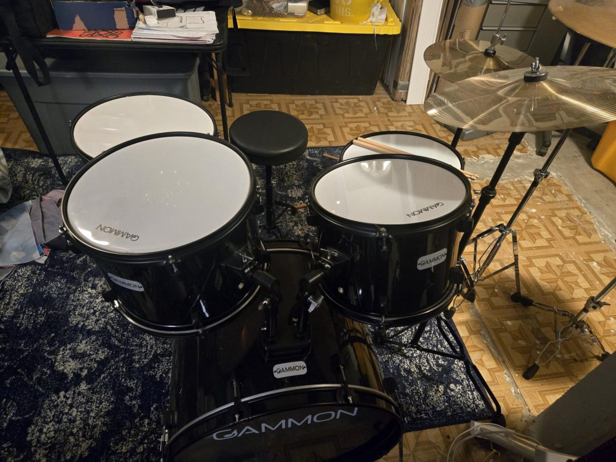 Charlie Karleskint (9) showcases his drum set at home. “I started playing in fourth grade, then stopped playing until sixth grade, then kept going because I wanted to keep playing music,” Karleskint said. Karleskint’s least favorite part of drumming was when he broke his sticks by hitting the drums too hard.