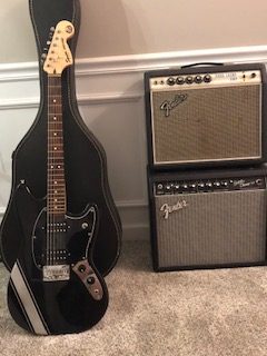 Eddie Morrison’s guitar sits in his room. “[Playing guitar] gave me a sense of better rhythm …" Morrison said, "and I know the keys now.” He added that he loved playing and listening to music alone in his living room.