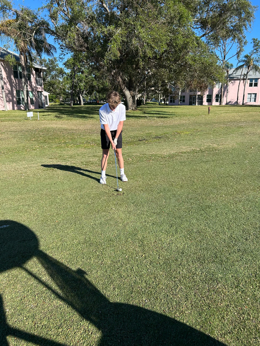 Austin Sahrhage (10) golfs in Florida with his family during the summer of 2025. “I really like golfing with my family because it is just a good time and makes me really happy,” Sahrhage said. He added that he liked golfing with his grandpa the most because they team up and win every time. 