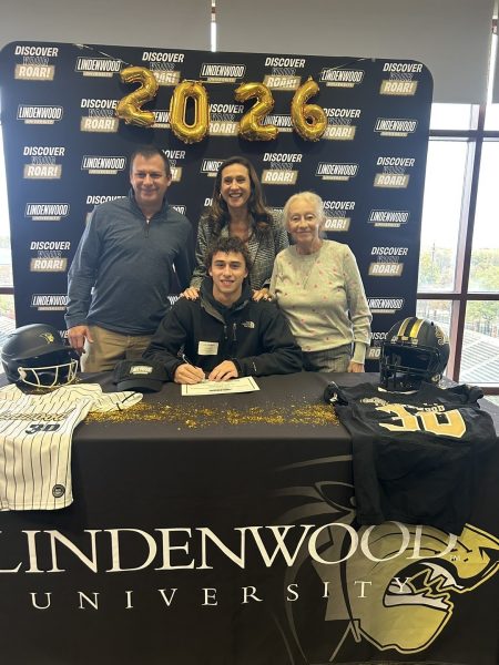 Lindenwood roller hockey commit Joe Stoessel and his family pose for a photo at Lindenwood's signing day. "I definitely want to start skating with the team at Lindenwood right now," Stoessel said. Stoessel added that his main athletic goal was to keep scoring goals.