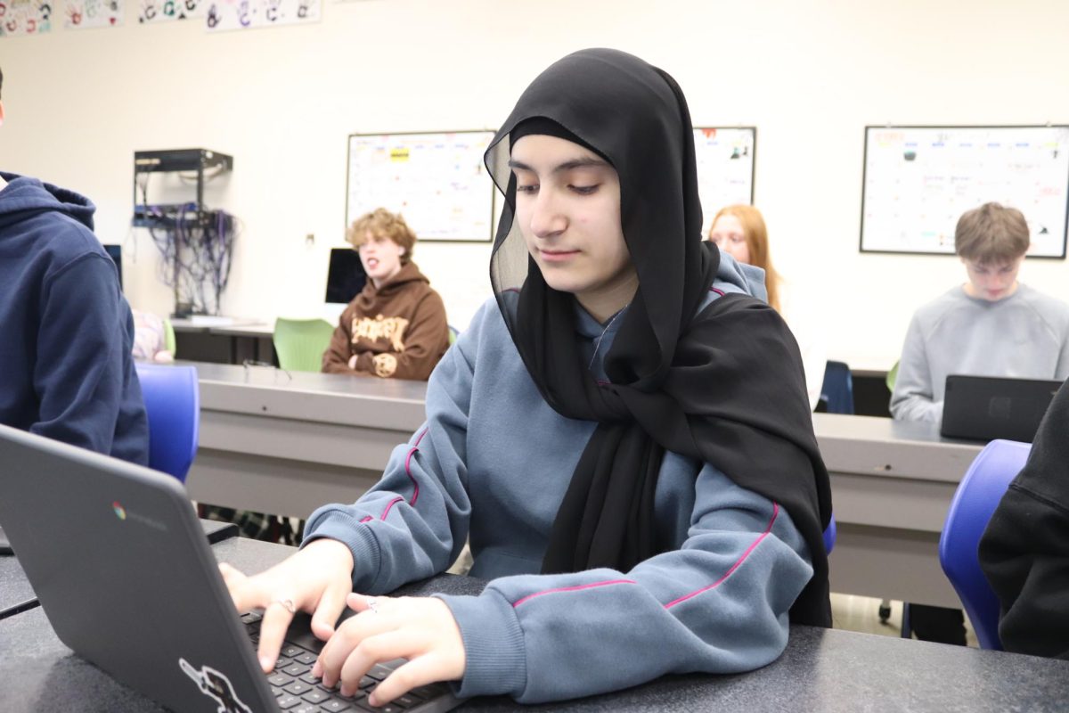 Zahra Abdali (9) works on an assignment in Journalism 1 on Nov 24, 2025. Abdali has to work on ninth grade level work, even though she is a year younger than other students. “The assignments in Journalism 1 aren’t easy, but I manage to get them done,” Abdali said.